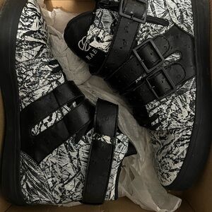 Black and White High-Top Sneakers with Buckles